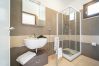 Detailed view of the modern bathroom design, featuring an elegant shower enclosure