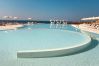 Relax by the pool with a panoramic view of the Calabrian sea